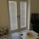 Adding Style And Functionality To Your Kitchen Patio Door With Blinds